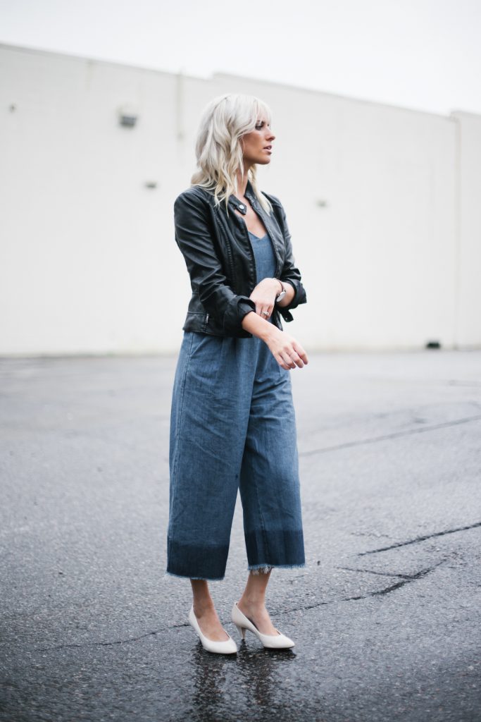 denim jumpsuit frayed wide leg culottes black biker leather jacket white kitten heels block blogger street style fall autumn 2016 // Charleston Fashion Blogger Dannon Like The Yogurt
