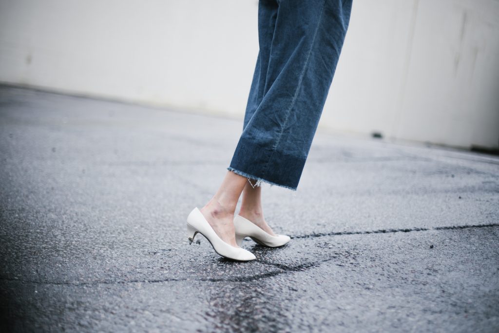 denim jumpsuit frayed wide leg culottes black biker leather jacket white kitten heels block blogger street style fall autumn 2016 // Charleston Fashion Blogger Dannon Like The Yogurt